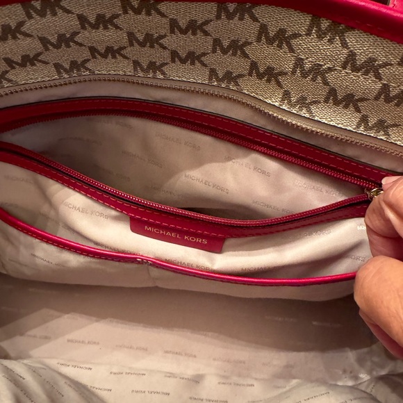 Michael Kors tote 19 length 11 wide zippered closures outside and out. 3 inside - Picture 9 of 11